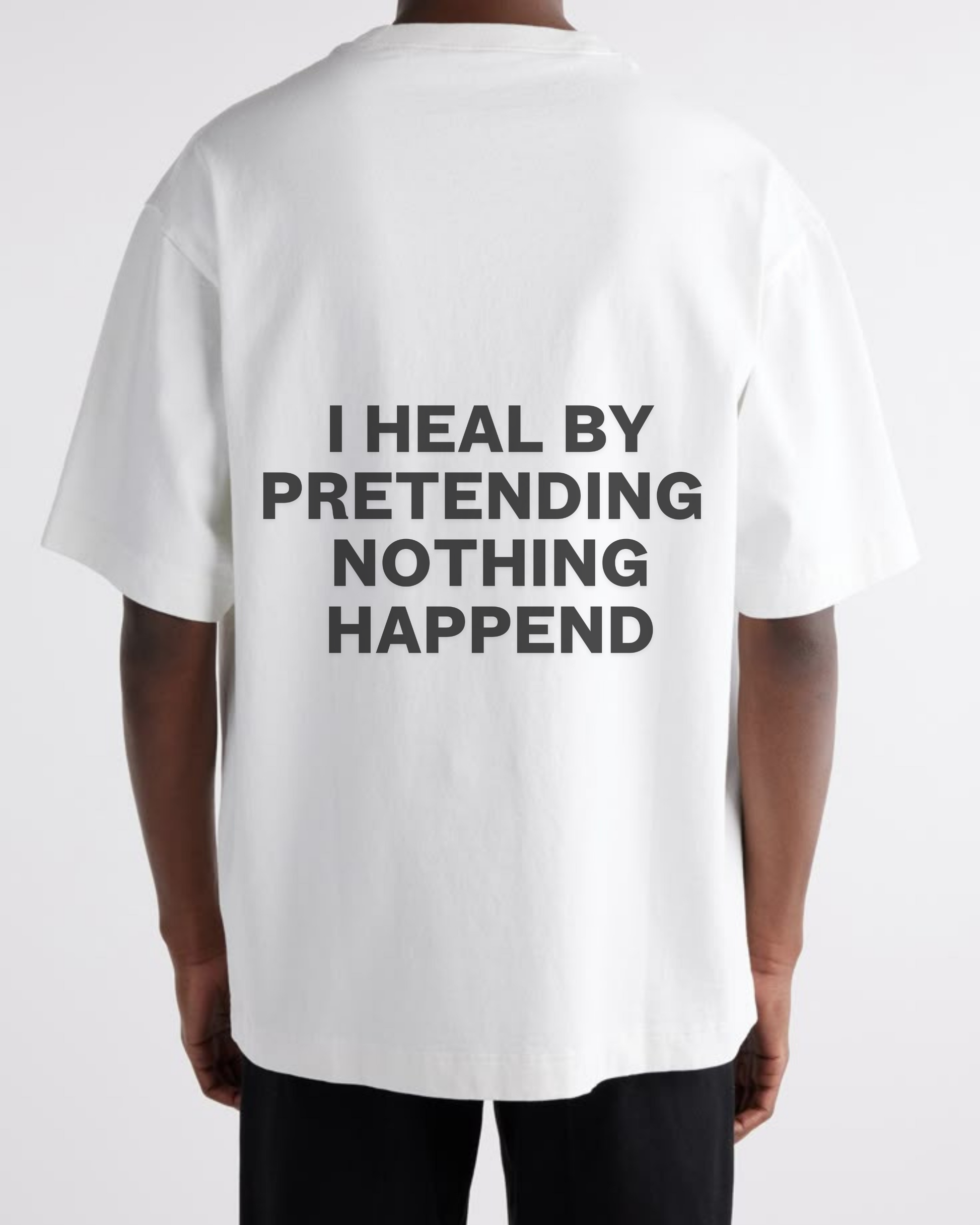I HEAL BY PRETENDING NOTHING HAPPEND Unisex Cotton T-shirt